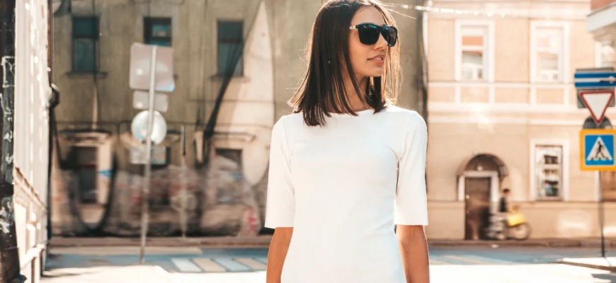 تنسيق فستان أبيض: كيف يمكنكِ اعتماده للوك دافىء في الشتاء؟