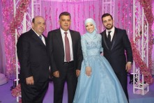 اللواء عباس إبراهيم ووالد العروس المهندس محمد دنش مع الخطيبين حسين وجنى